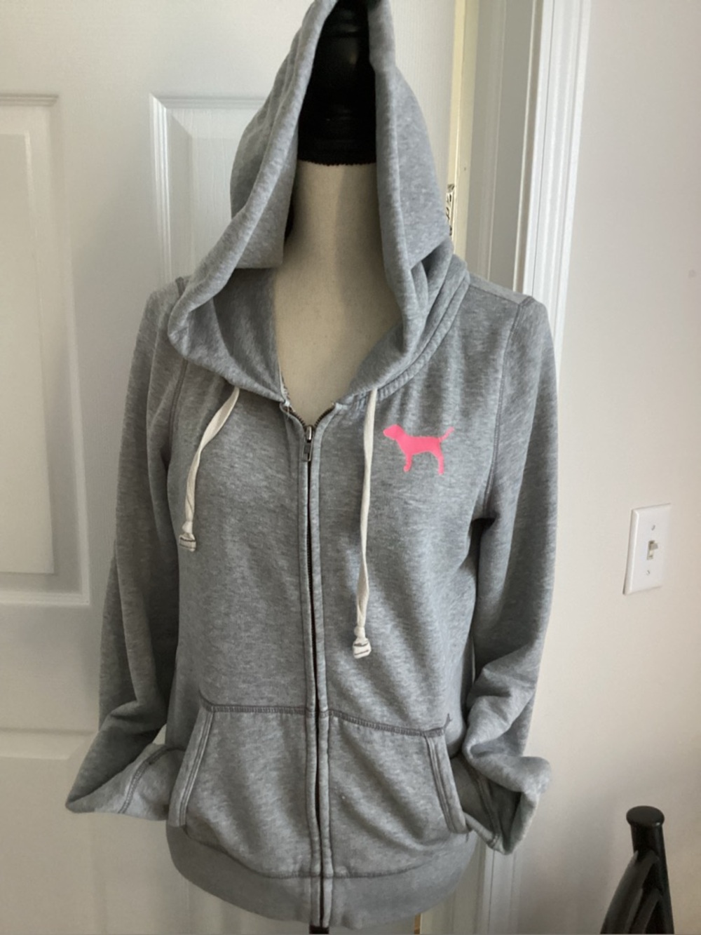 neon letter vs pink hoodie